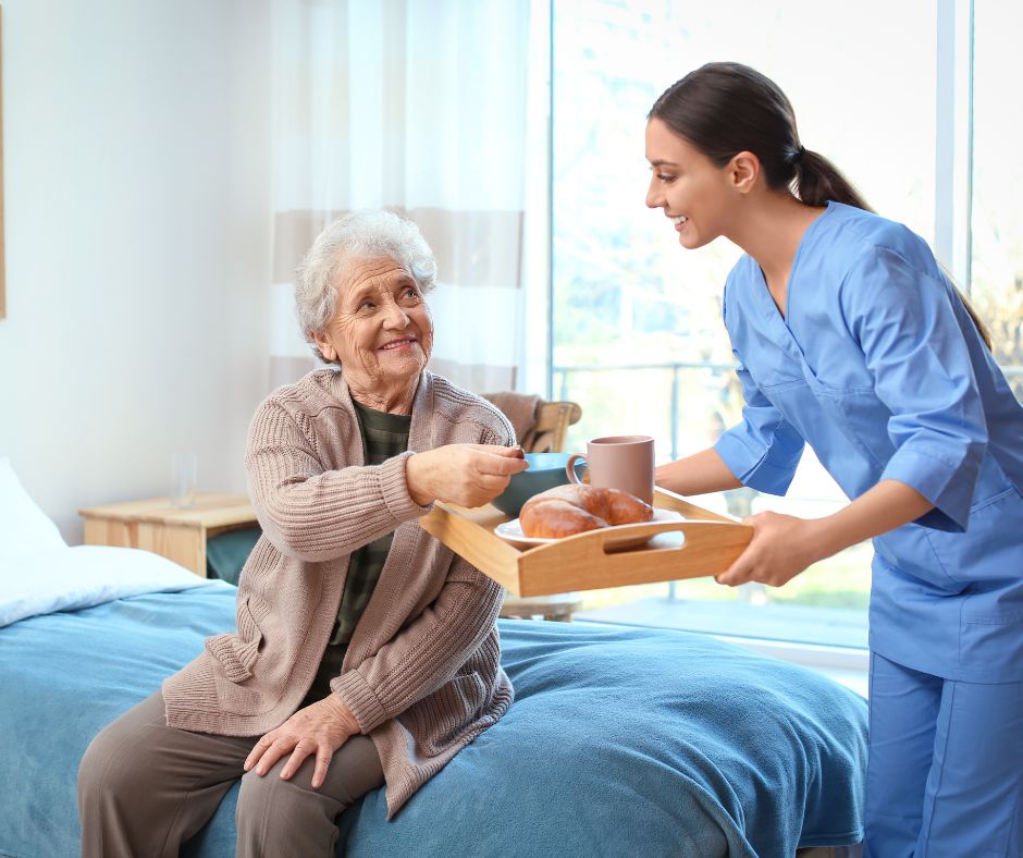 caregiver serving meal